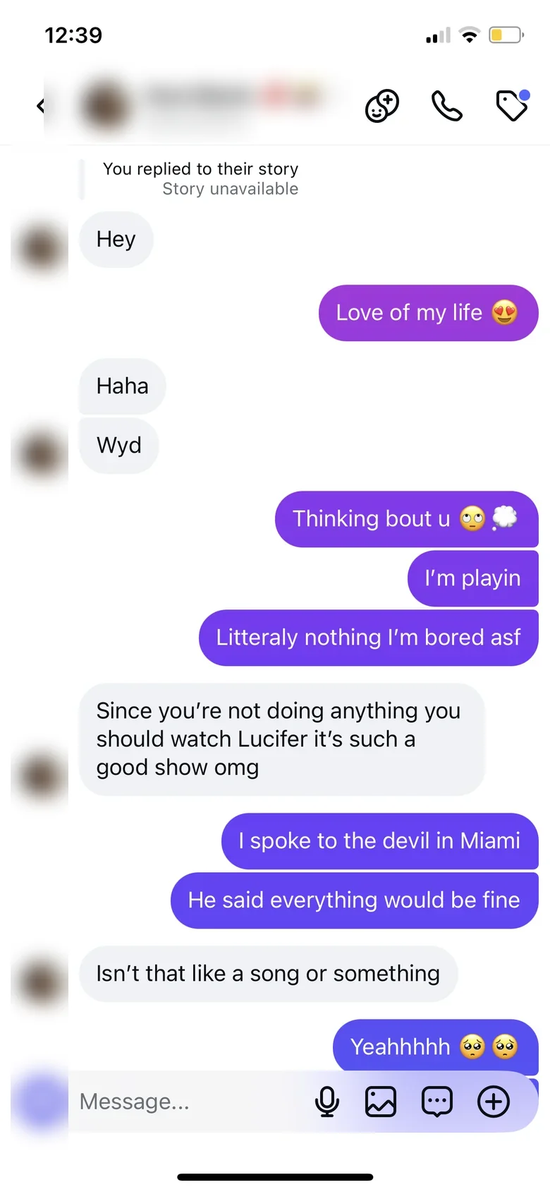 A message conversation in which he compliments and chases and she gives short replies.